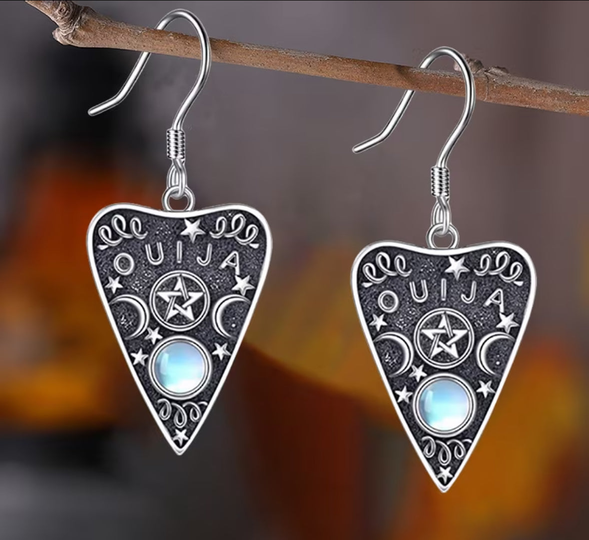 Aretes Ouija
