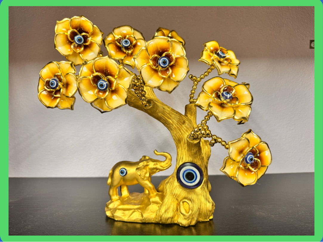 Árbol con elefantes y ojos turcos