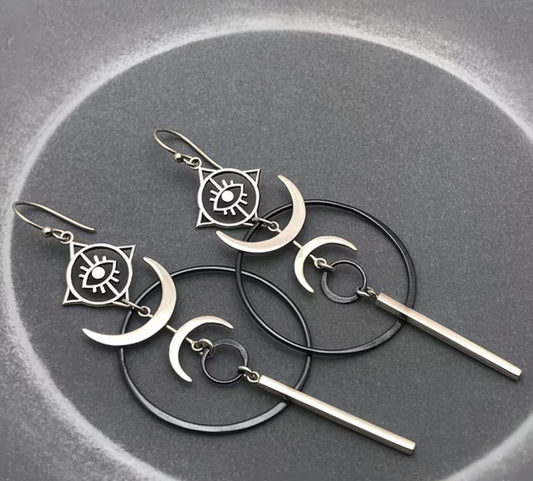 Aretes lunas y ojo
