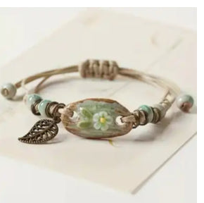 Pulsera flor en porcelana